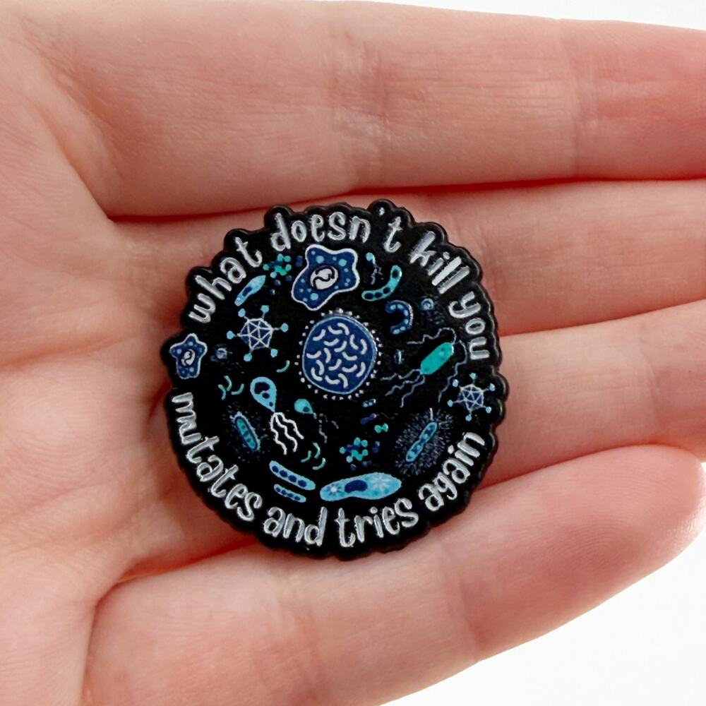 What Doesn't Kill You Mutates and Tries Again Enamel Pin